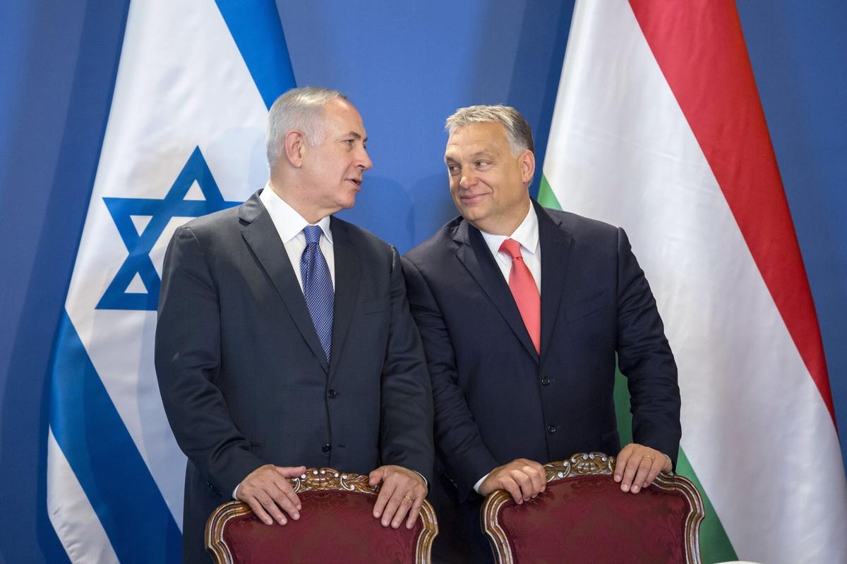 FILE - Israeli Prime Minister Benjamin Netanyahu, left, and his Hungarian counterpart Viktor Orban chat as they attend a signing ceremony in the Parliament building in Budapest, Hungary, Tuesday, July 18, 2017. (Balazs Mohai/MTI via AP, File). FILE PHOTO HUNGARY OUT