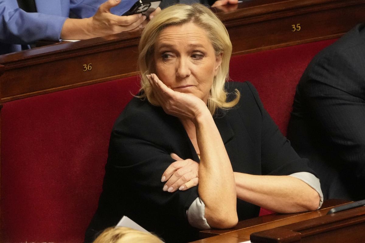 French far-right leader Marine Le Pen attends a session at the National Assembly, Tuesday, April 1, 2025 in Paris. (AP Photo/Michel Euler)
